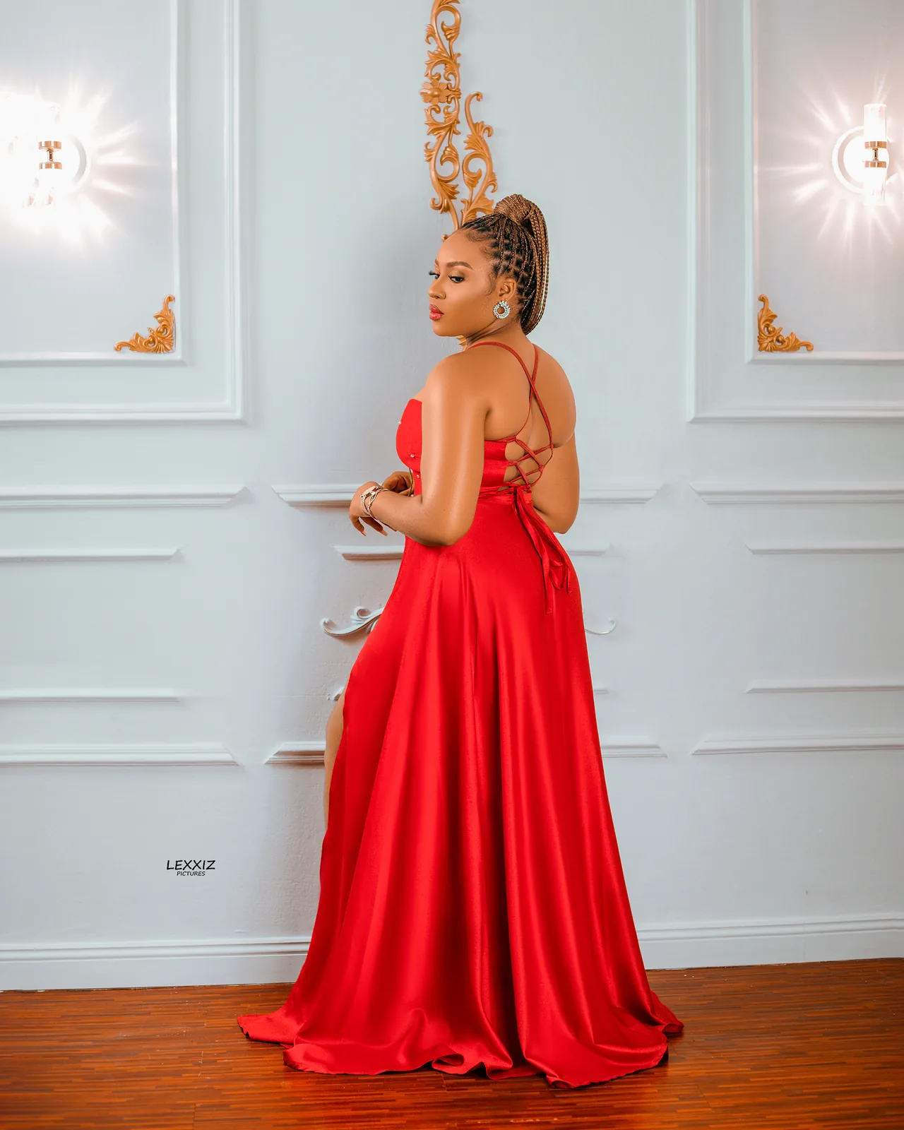 Model wearing a red custom dress